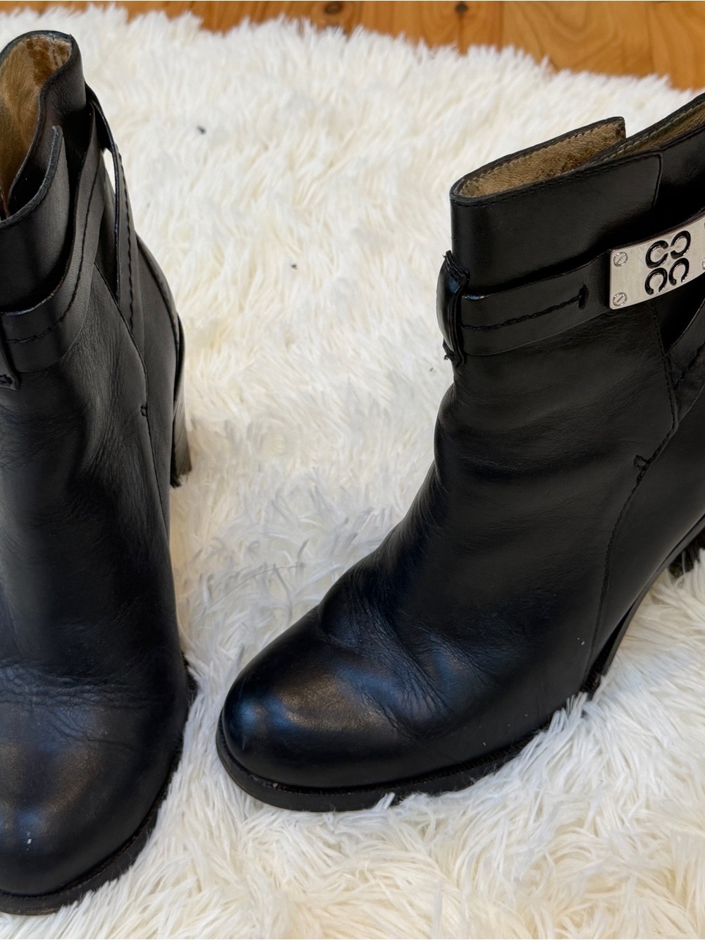Coach Black Leather Ankle Booties with Silver Logo Plate